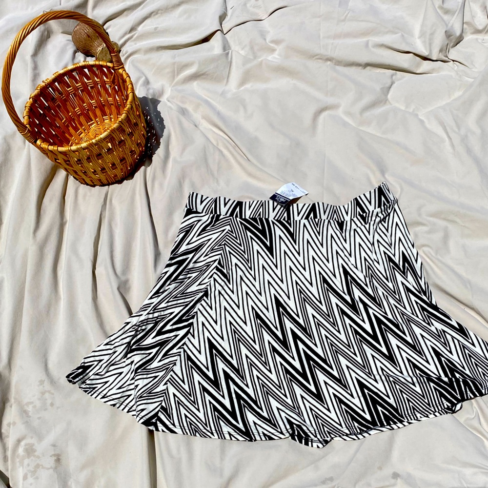 Cute black and white striped skirt.  New with tags